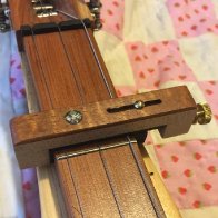 New Ron Ewing Custom Capo (Curly Koa).jpg