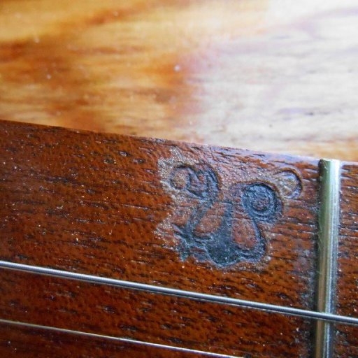 Swan Dulci Logo on Fretboard