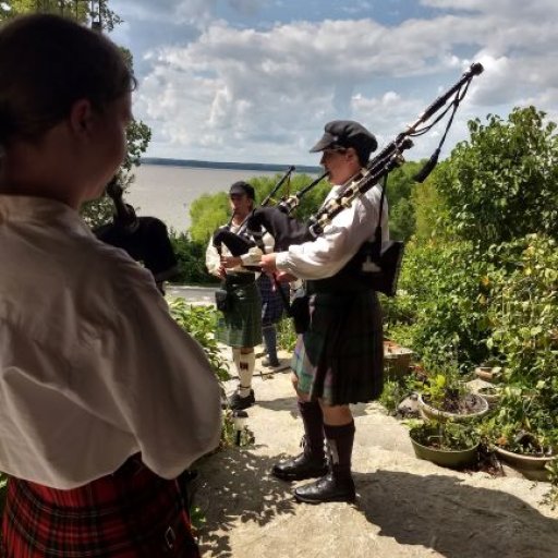 Bag pipers on the porch