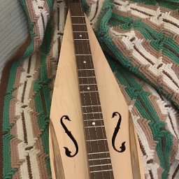 Ron Gibson dulcimer on afghan-2025.jpg