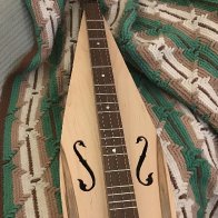 Ron Gibson dulcimer on afghan-2025