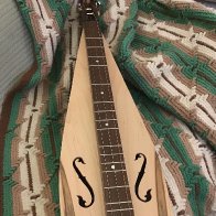Ron Gibson dulcimer on afghan-2025.jpg