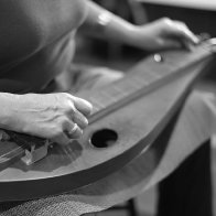 me playing May dulcimer-IN-Flute-Circle-Aug 2025