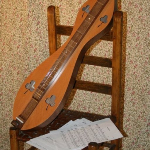 Dulcimer with chair & music