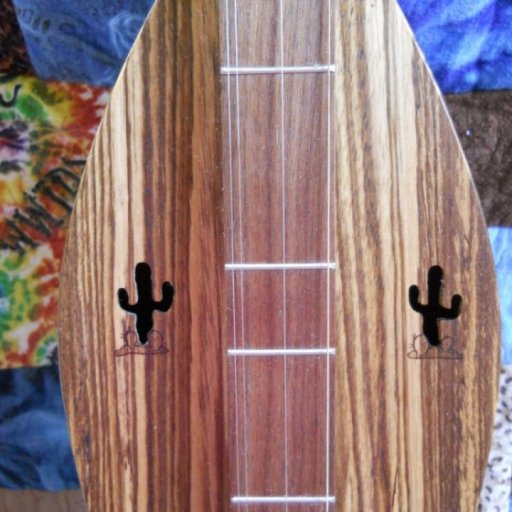 "Kokopelli" dulcimer by Molly McCurdy, Light o' the Moon Dulcimers