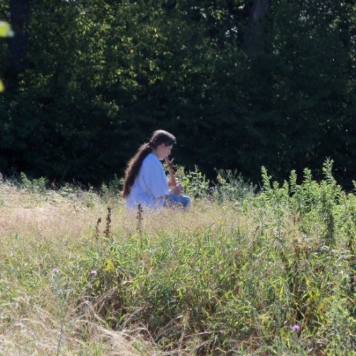 Miki playing her native american flute