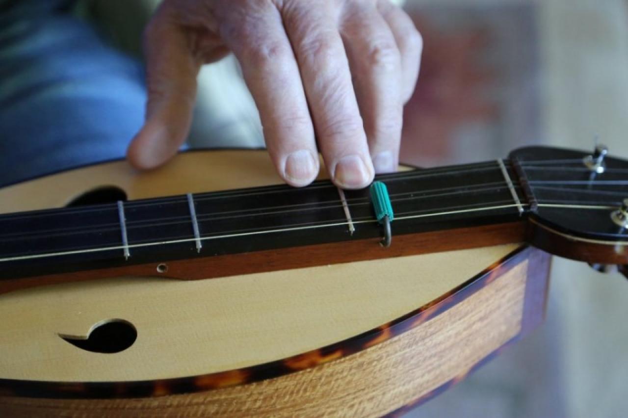 Closeup Of Hennessy Dulcimer With Interesting Capo Design Photos