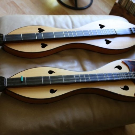 Two Hennessy dulcimers side by side