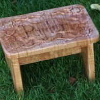 Child`s step stool with carved top
