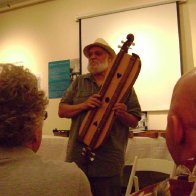 Don showing a courting dulcimer