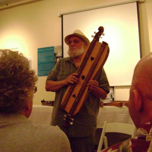 Don showing a courting dulcimer