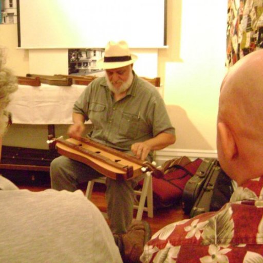 Don showing a courting dulcimer