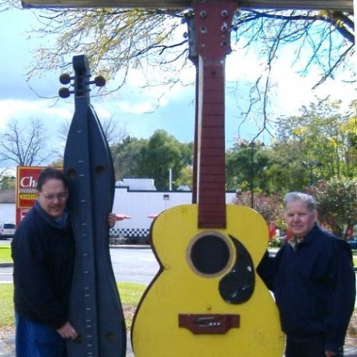 Mr. Victor and I at his store