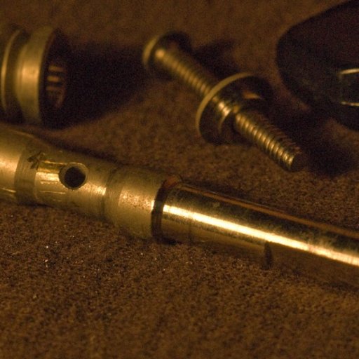 Friction tuner parts with graphite dust