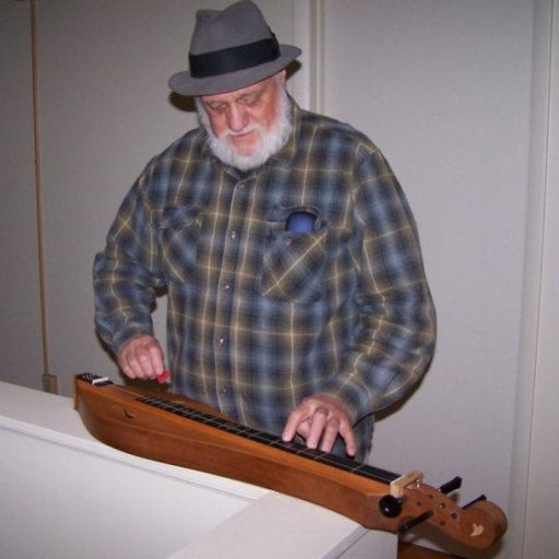 Don playing Rob's dulcimer...