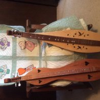 Dulcimers and quilt.