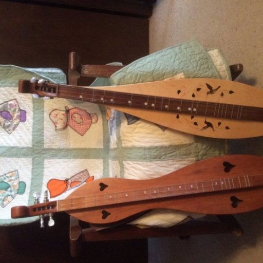 Dulcimers and quilt.