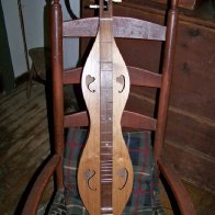 Dulcimer and chair