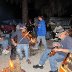 Michael Vickey and Matt Miller jam around the campfire.