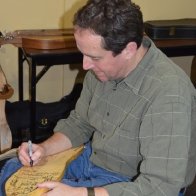 Signing the Wartz Dulcimer