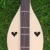 4 string hourglass dulcimer made by John Rawlinson